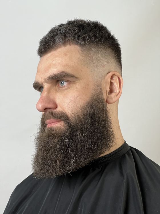 A full beard shaped with a tight skin fade at Evoke Barbers, Nottingham